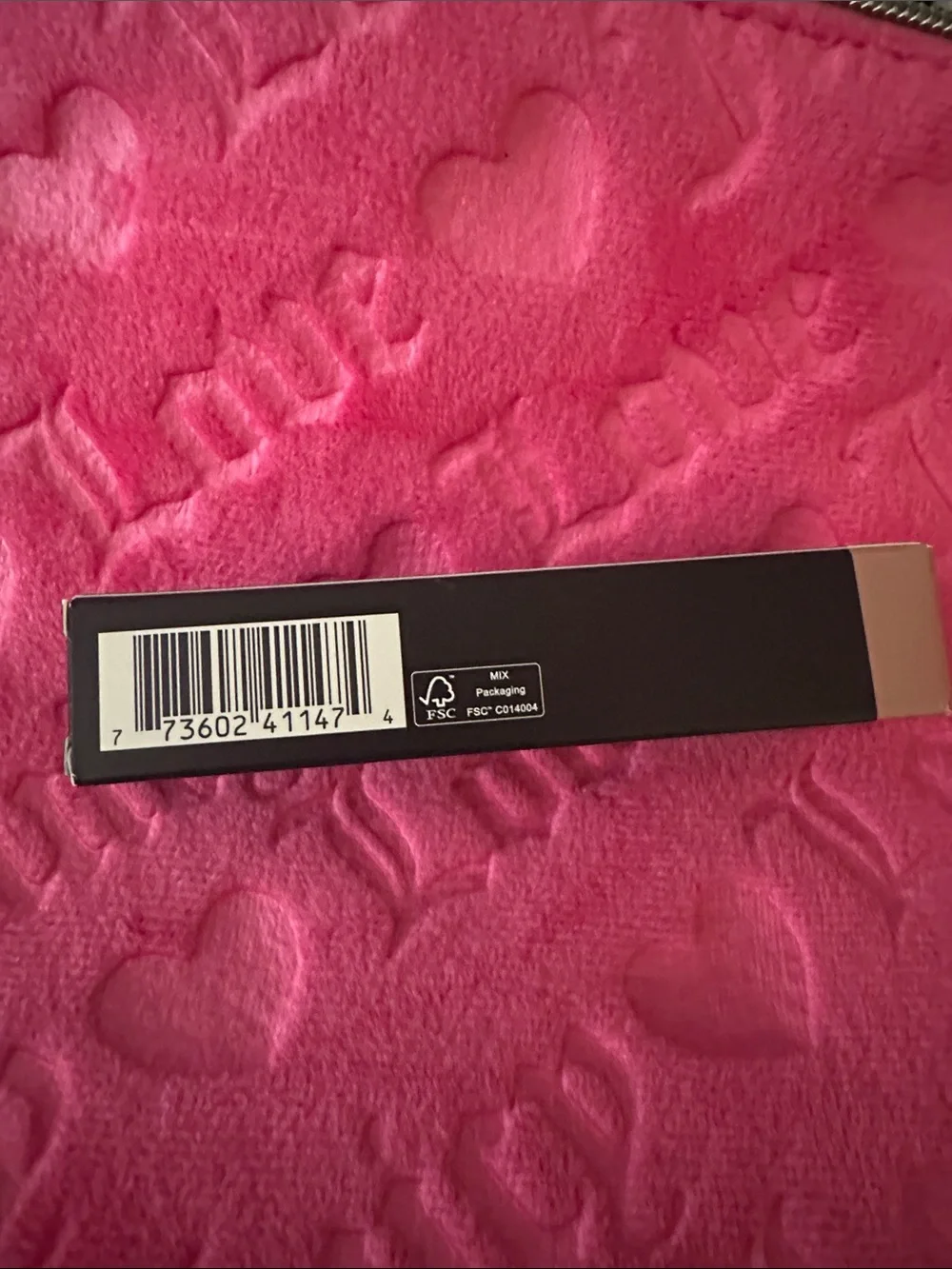 MAC Lipglass in Oyster Girl